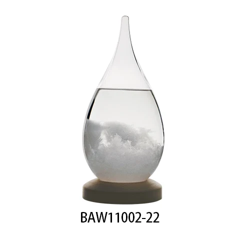 Drop-shaped storm glass on a dark base
