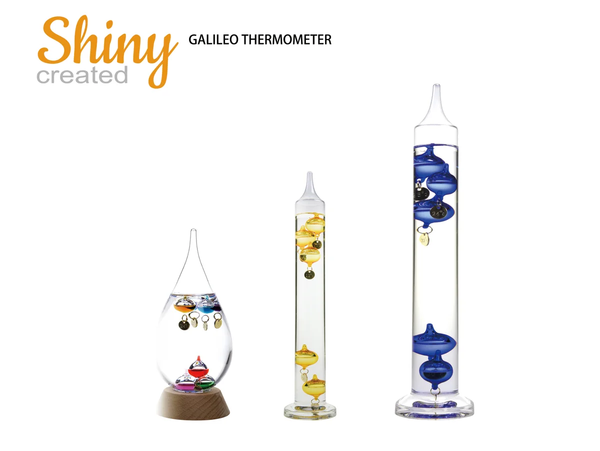 Three Galileo thermometers in drop and column shapes